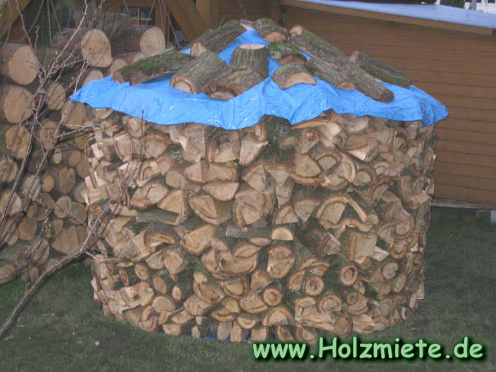 Heizen mit Holz im Specksteinofen